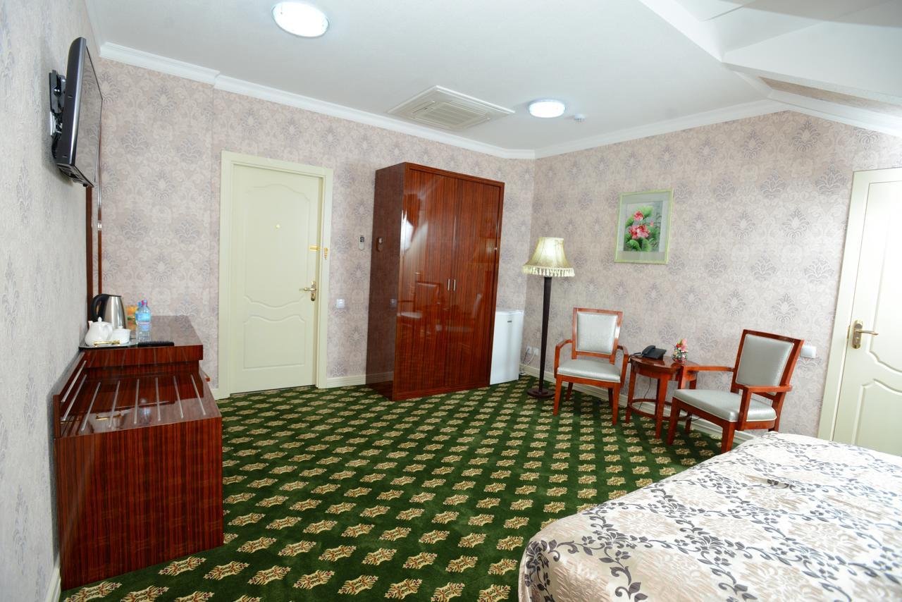 Habitación Doble Deluxe (2 adultos + 1 niño)
